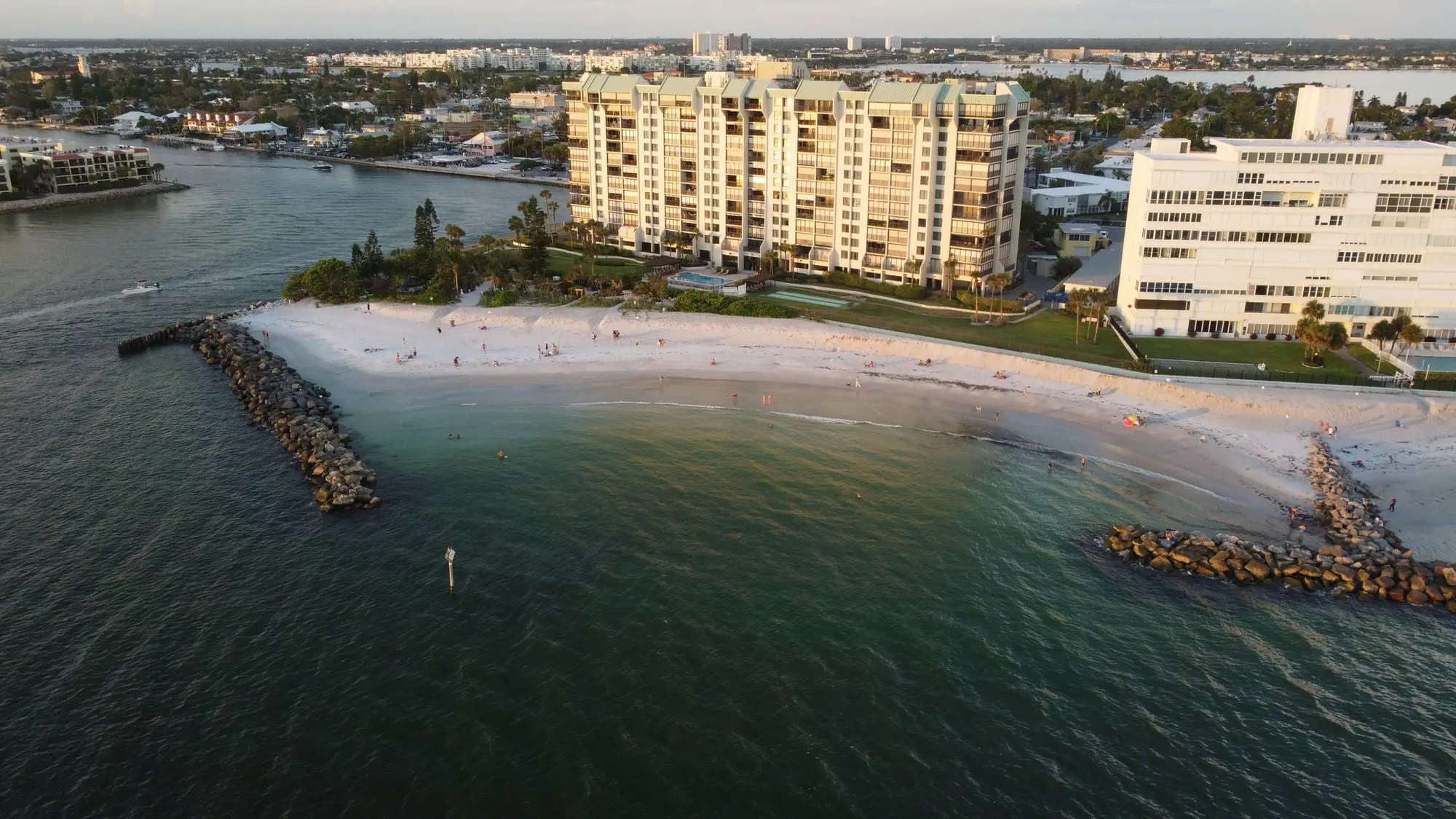 Aerial view of beachfront apartments on the Gulf coast at sunset