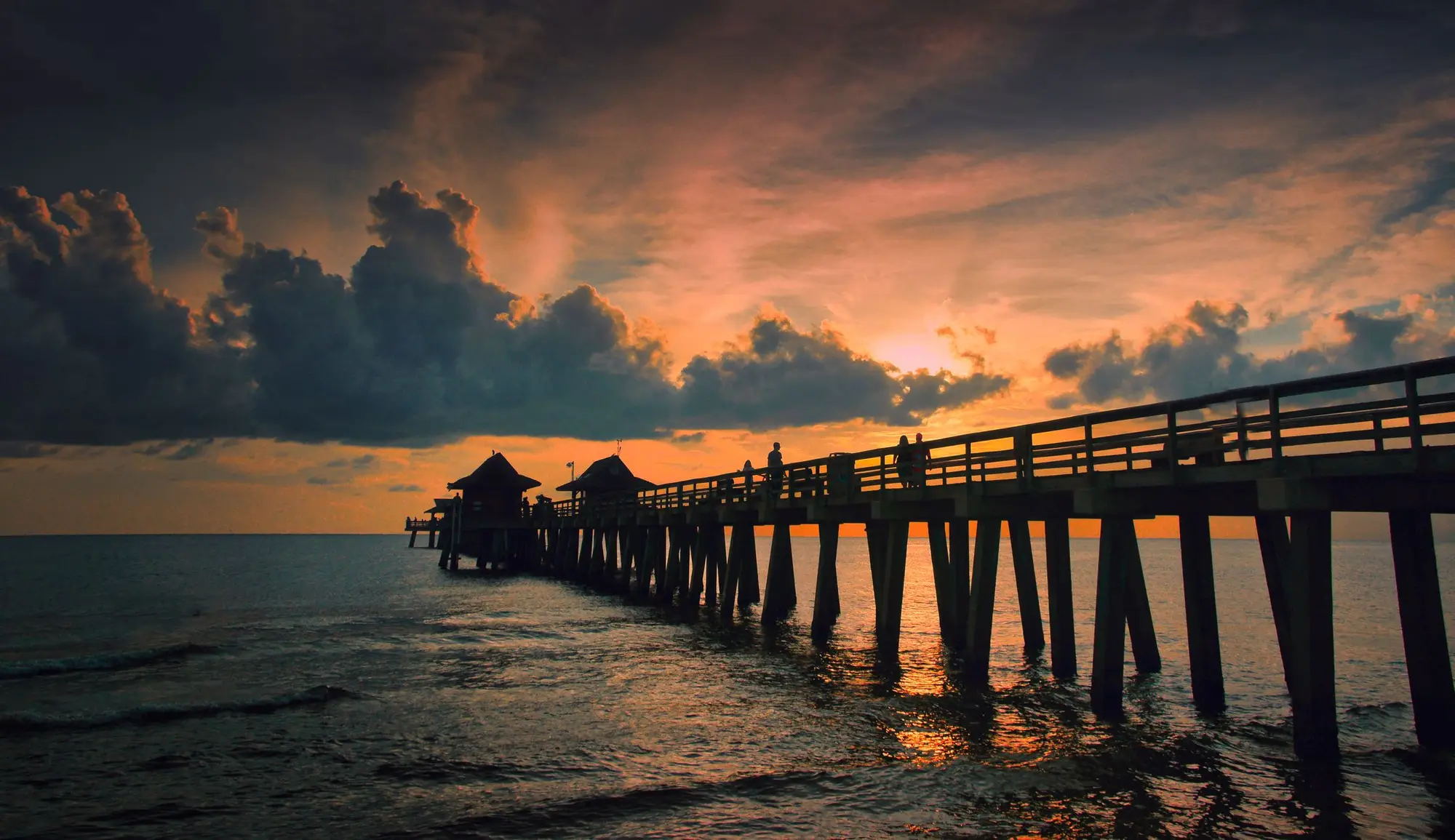 The Naples Pier at golden hour on the Gulf of Mexico